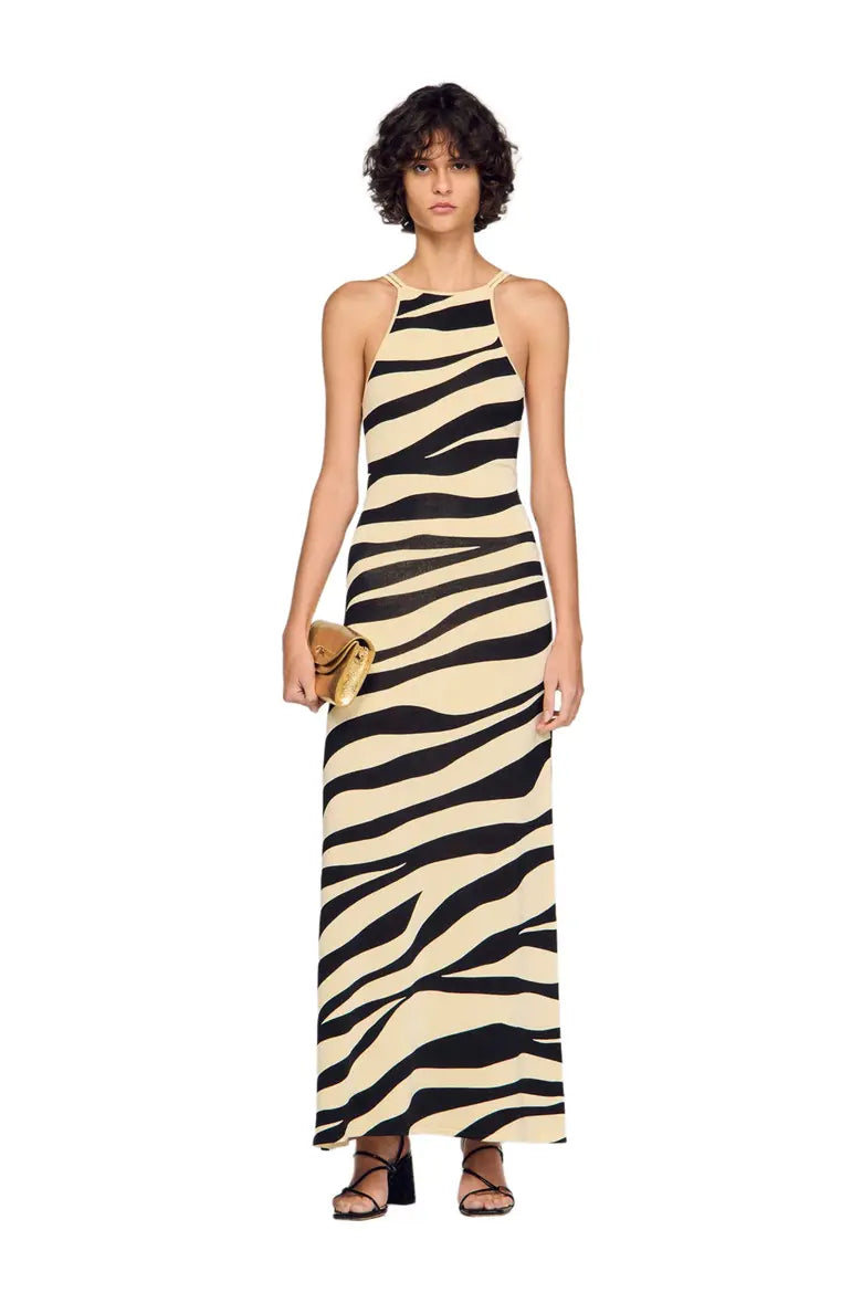 Zebra print knit maxi dress with strappy open back and black heeled sandals — Sandro | Endless UAE