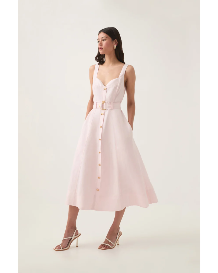 Pale pink sleeveless midi dress with sweetheart neckline, gold button front, and gold belt — Aje | Endless UAE