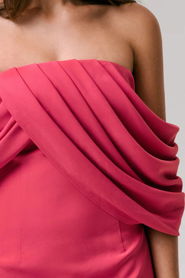 Woman wearing hot pink off-shoulder draped maxi dress with elegant draping detail — Club L London | Endless UAE