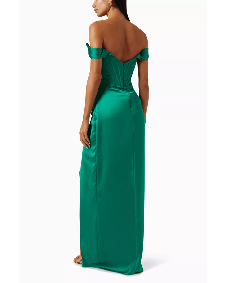 Woman wearing emerald green off-shoulder gown with draped details and high slit — Tarik Ediz | Endless UAE