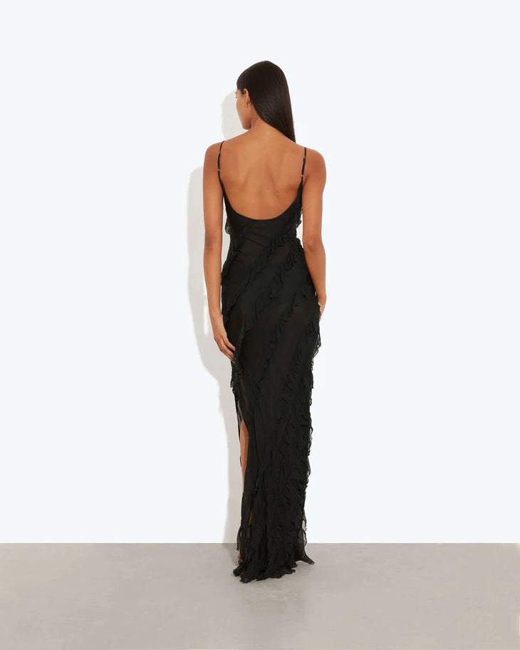 Woman wearing black sleeveless Selena Dress with ruched detailing and diagonal seaming — Rat & Boa | Endless UAE