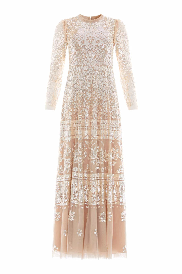 Woman wearing blush sequined Aurora Gown with long sleeves and tiered lace detailing — Needle & Thread | Endless UAE