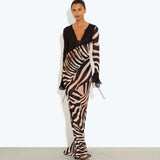 Sabine Dress in zebra print with long sheer sleeves and deep V-neckline — Rat & Boa | Endless UAE
