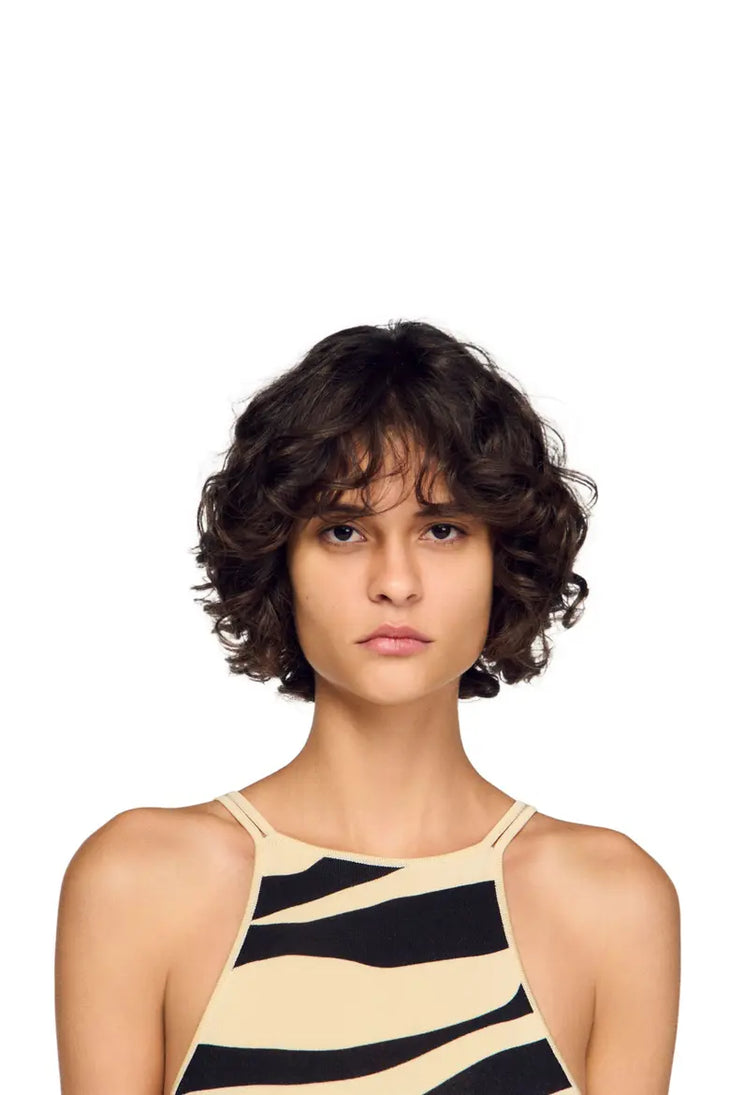 Zebra print knit maxi dress with strappy open back and black heeled sandals — Sandro | Endless UAE