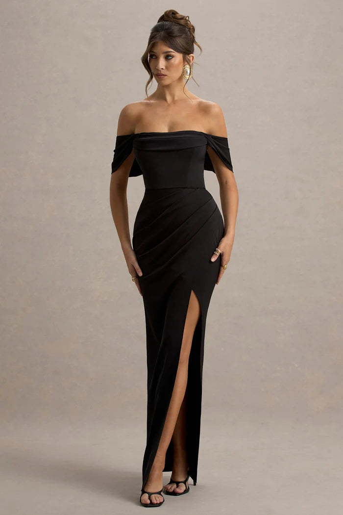 Woman wearing black satin off-shoulder maxi dress with high slit — Club L London | Endless UAE