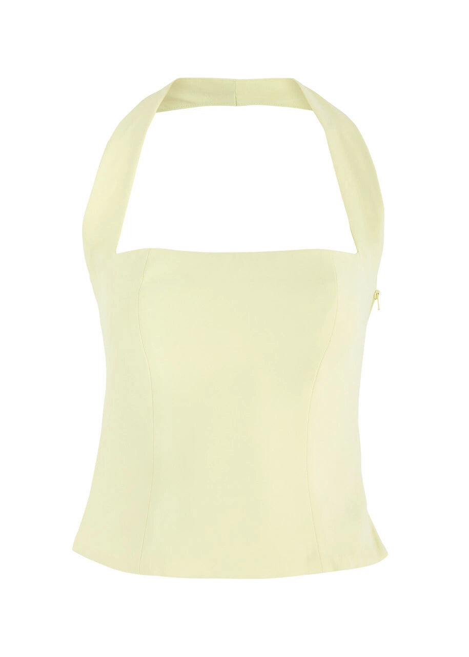 Pale yellow halterneck twill top with square neckline and sleeveless design — Odd Muse | Endless UAE
