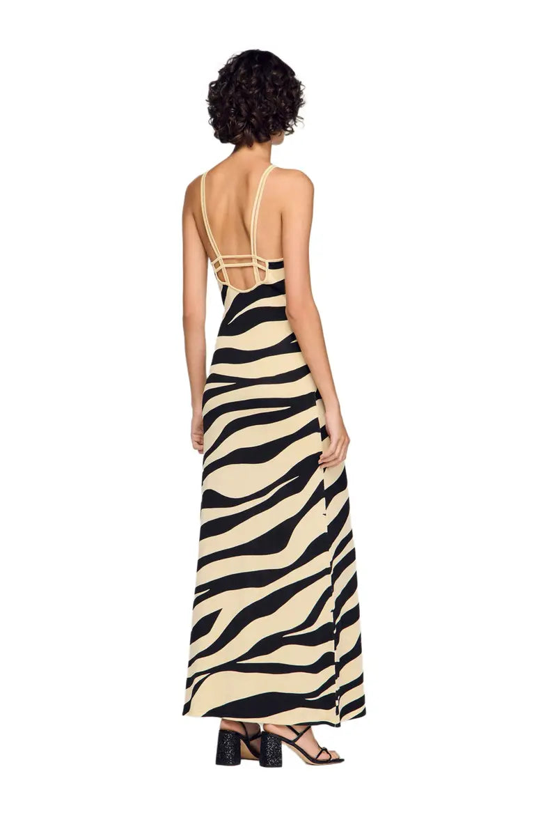 Zebra print knit maxi dress with strappy open back and black heeled sandals — Sandro | Endless UAE