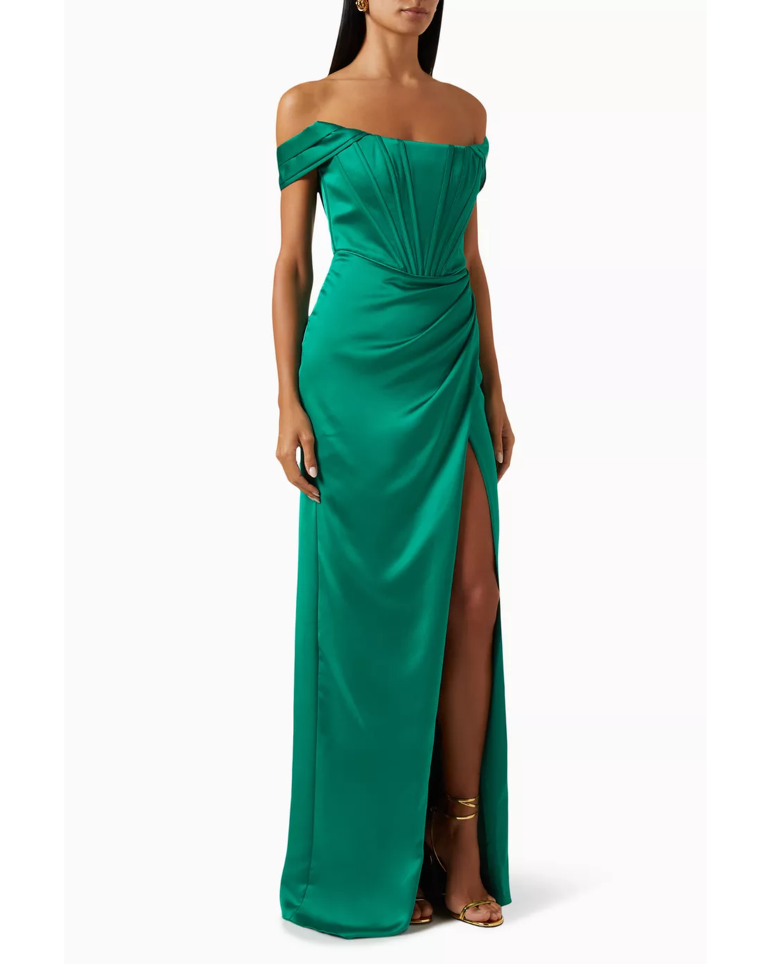 Woman wearing emerald green off-shoulder gown with draped details and high slit — Tarik Ediz | Endless UAE