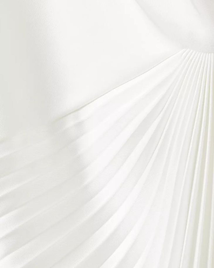White asymmetrical pleated midi dress with gold accessories — Chats By C.Dam | Endless UAE