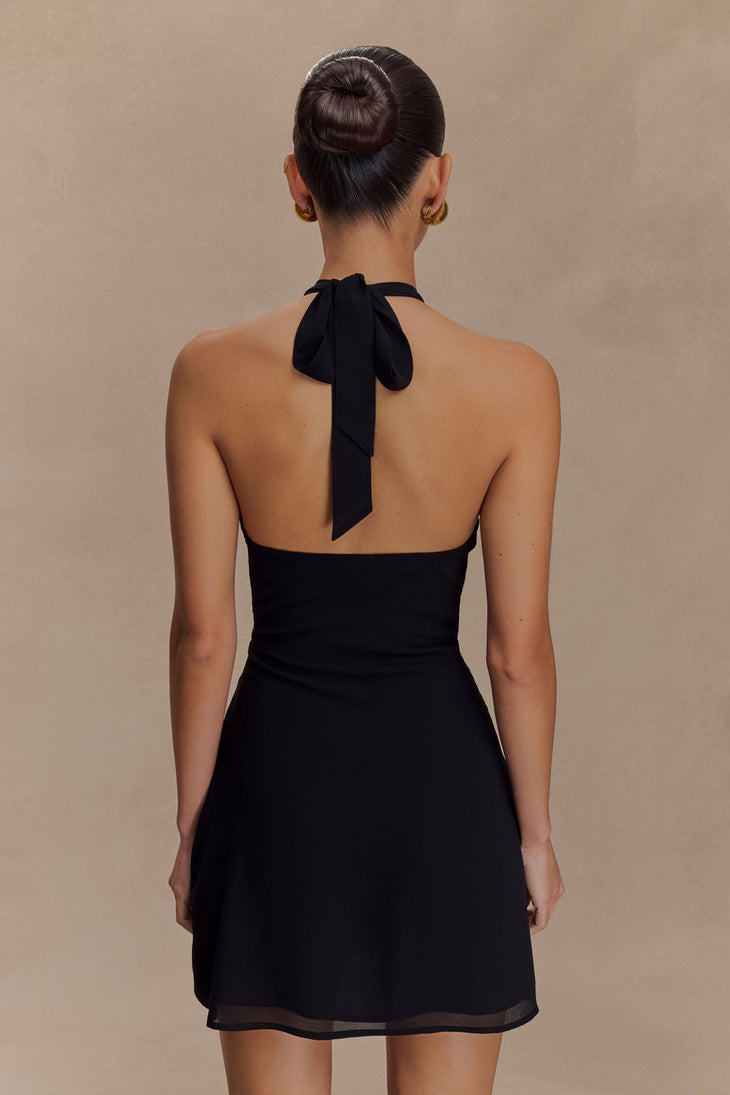 Black halter mini dress with plunging neckline and A-line silhouette — Meshki | Endless UAE