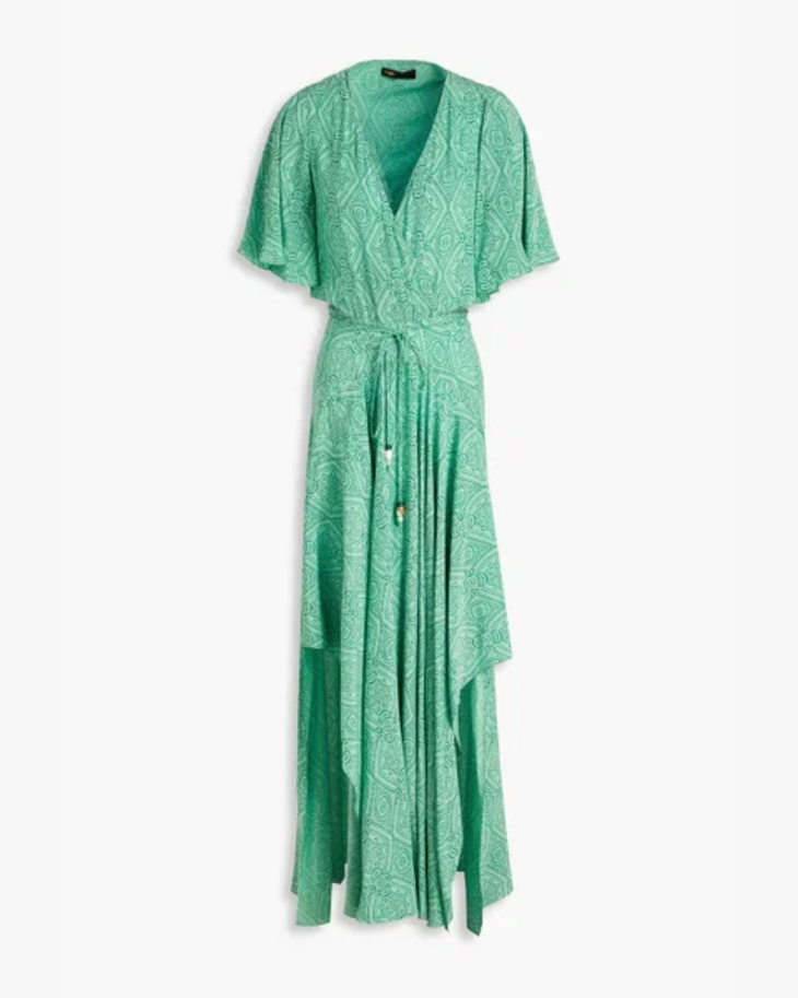 Woman wearing green printed maxi dress with flutter sleeves and back cutout detail — Maje | Endless UAE