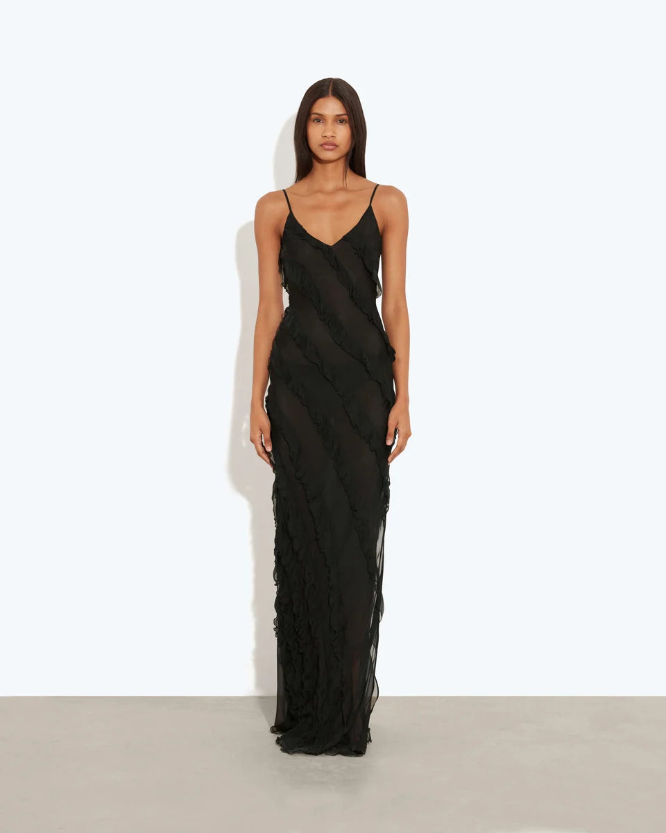Woman wearing black sleeveless Selena Dress with ruched detailing and diagonal seaming — Rat & Boa | Endless UAE