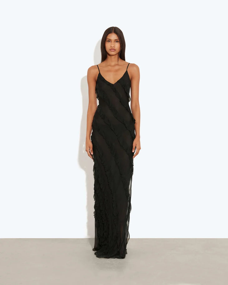 Woman wearing black sleeveless Selena Dress with ruched detailing and diagonal seaming — Rat & Boa | Endless UAE
