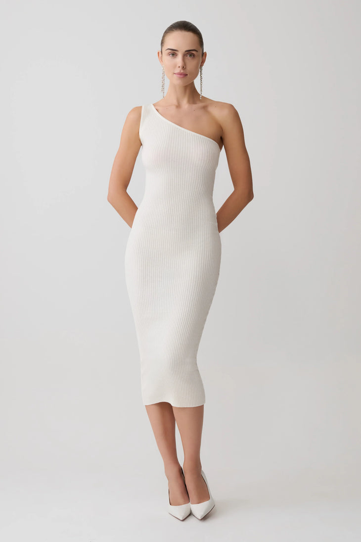 Woman wearing cream cashmere blend knit midi dress with draped off-shoulder overlay and white pointed heels — Meshki | Endless UAE