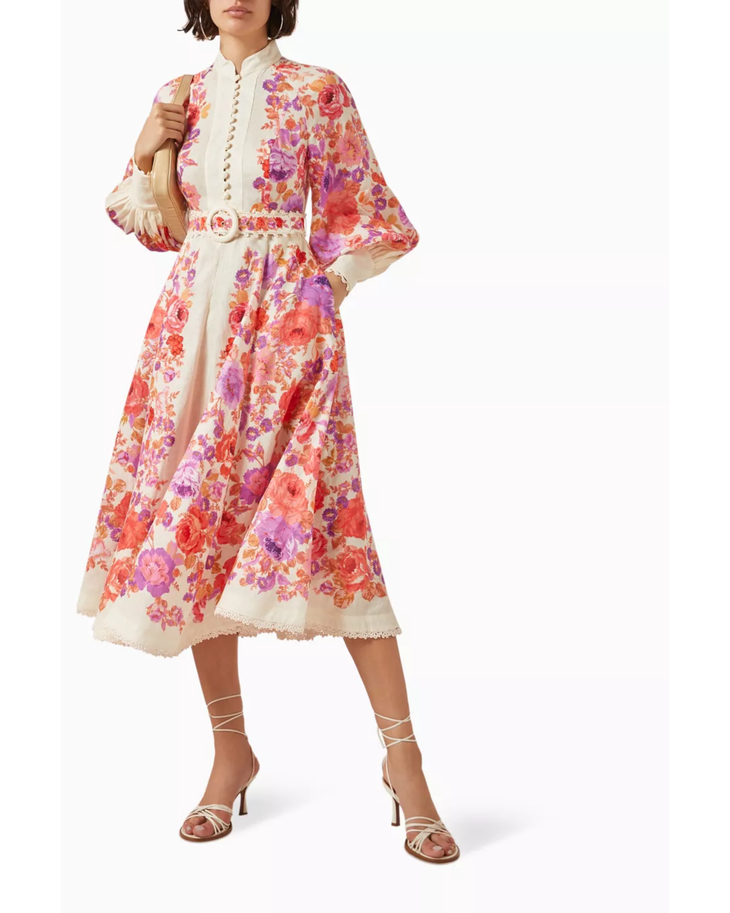Woman wearing a floral-print midi dress with cream trim and matching strappy sandals — Zimmermann | Endless UAE