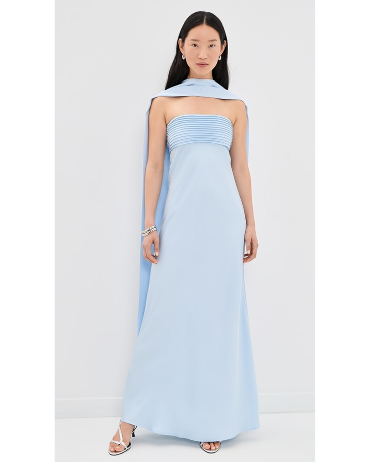 Woman wearing light blue sleeveless Elsa Maxi Dress with flowing duster — Runaway The Label | Endless UAE