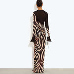 Sabine Dress in zebra print with long sheer sleeves and deep V-neckline — Rat & Boa | Endless UAE