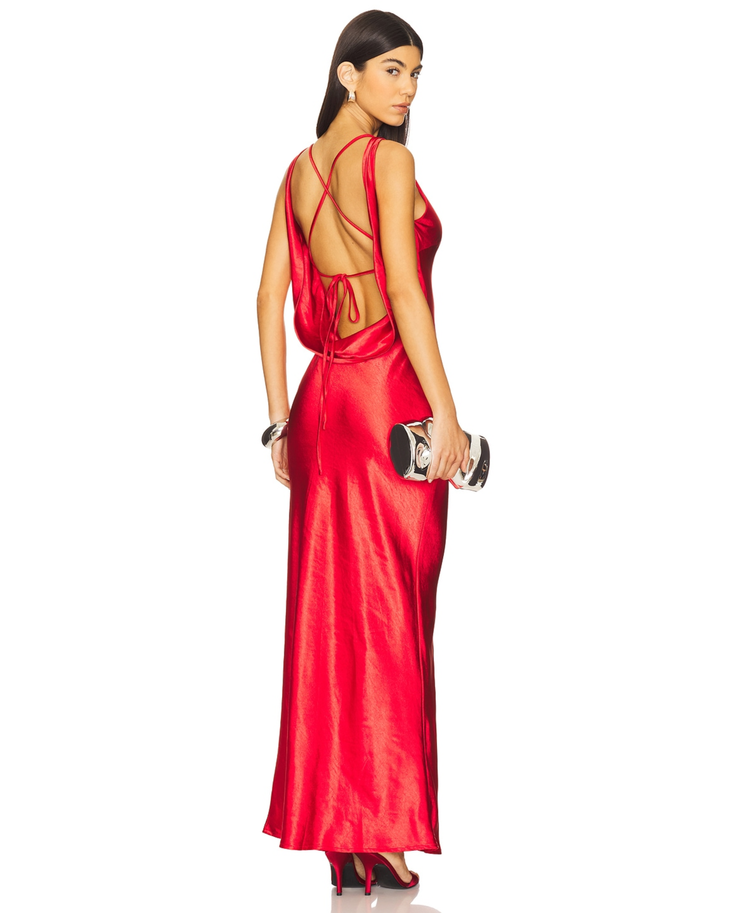 Red sleeveless maxi dress with metallic clutch and silver bangles — Runaway The Label | Endless UAE
