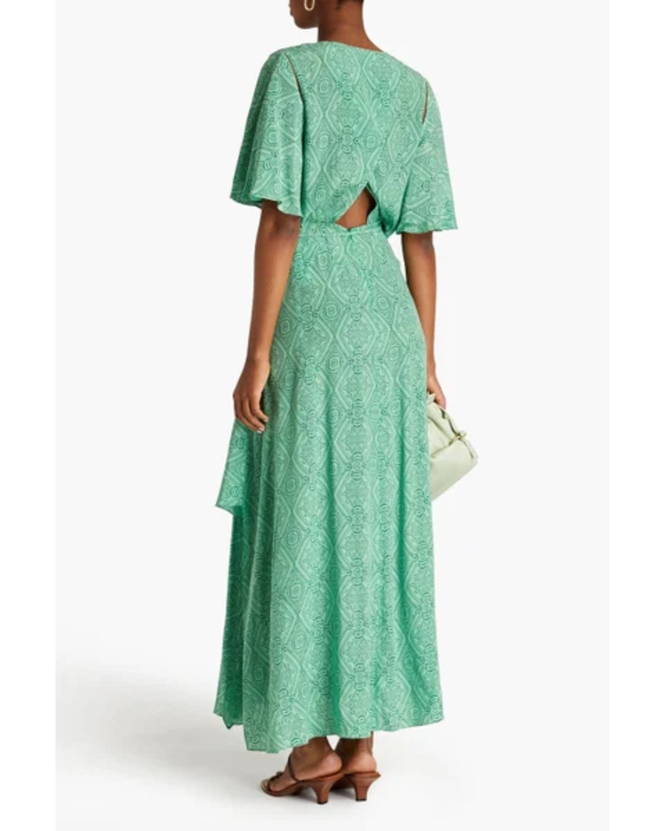 Woman wearing green printed maxi dress with flutter sleeves and back cutout detail — Maje | Endless UAE
