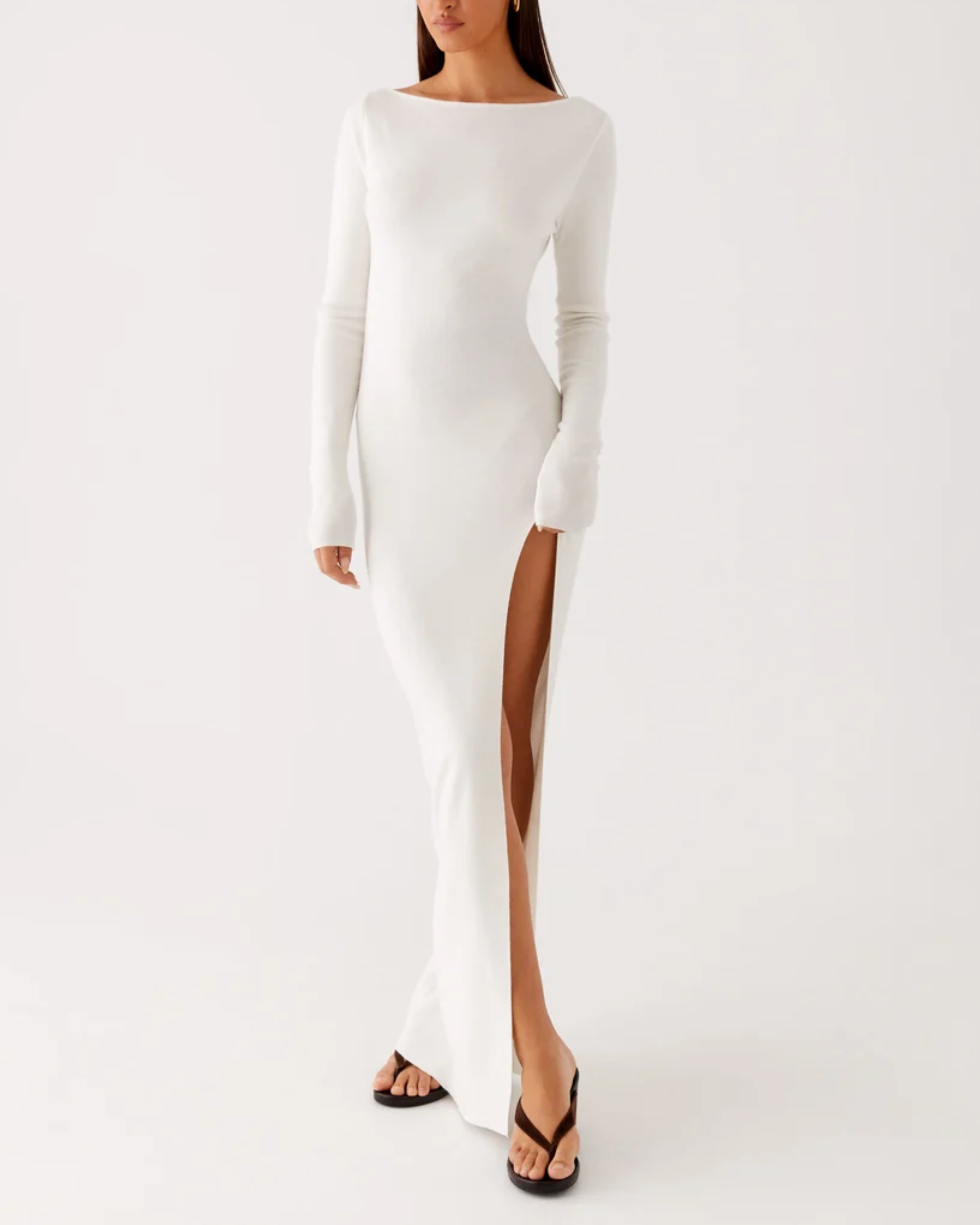 White long-sleeve knit maxi dress with high slit detail — Peppermayo | Endless UAE