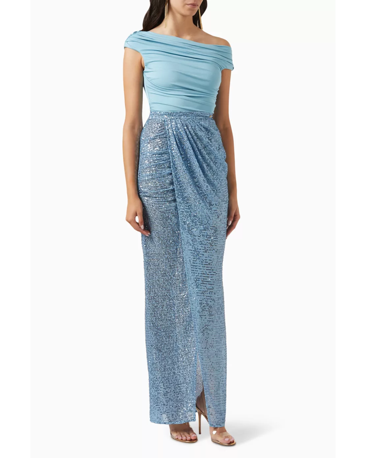 Woman wearing light blue off-shoulder top with sequined blue maxi skirt — Elisabetta Franchi | Endless UAE