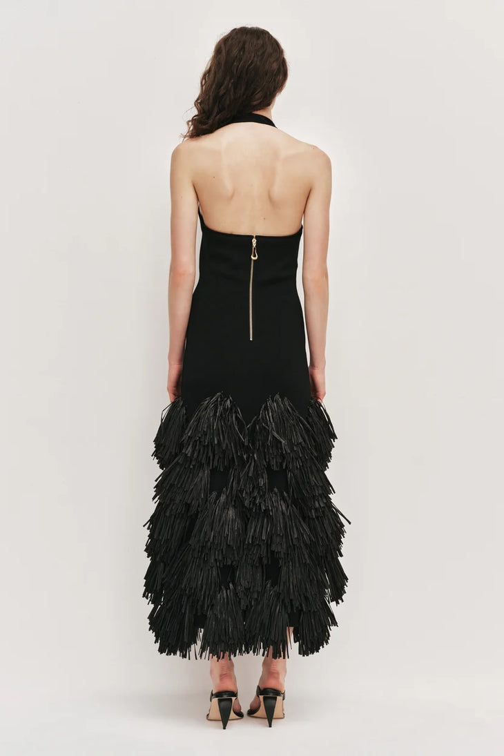Black halter neck knit dress with tiered raffia fringe skirt — Aje | Endless UAE