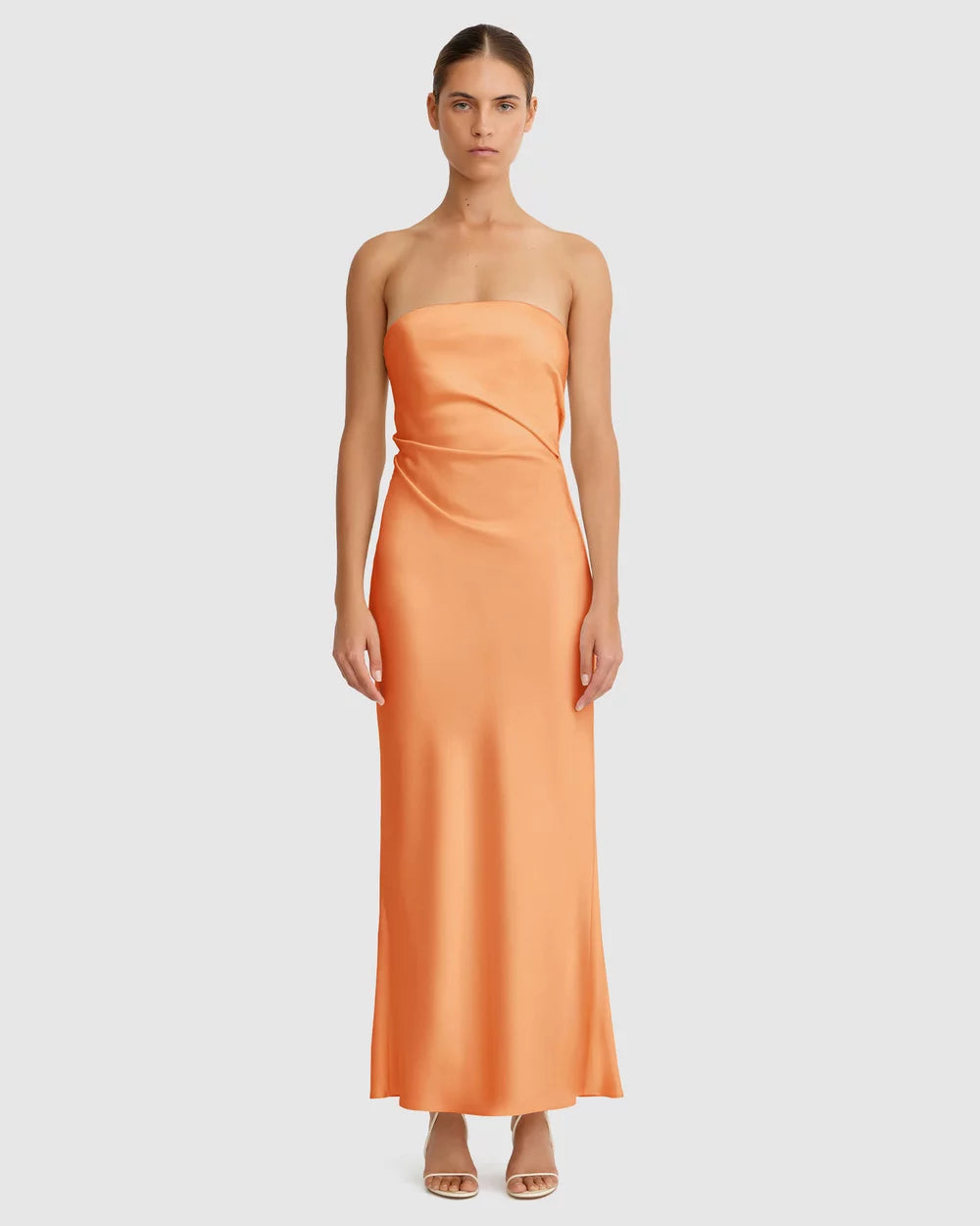 Woman wearing orange strapless maxi dress — Significant Other | Endless UAE