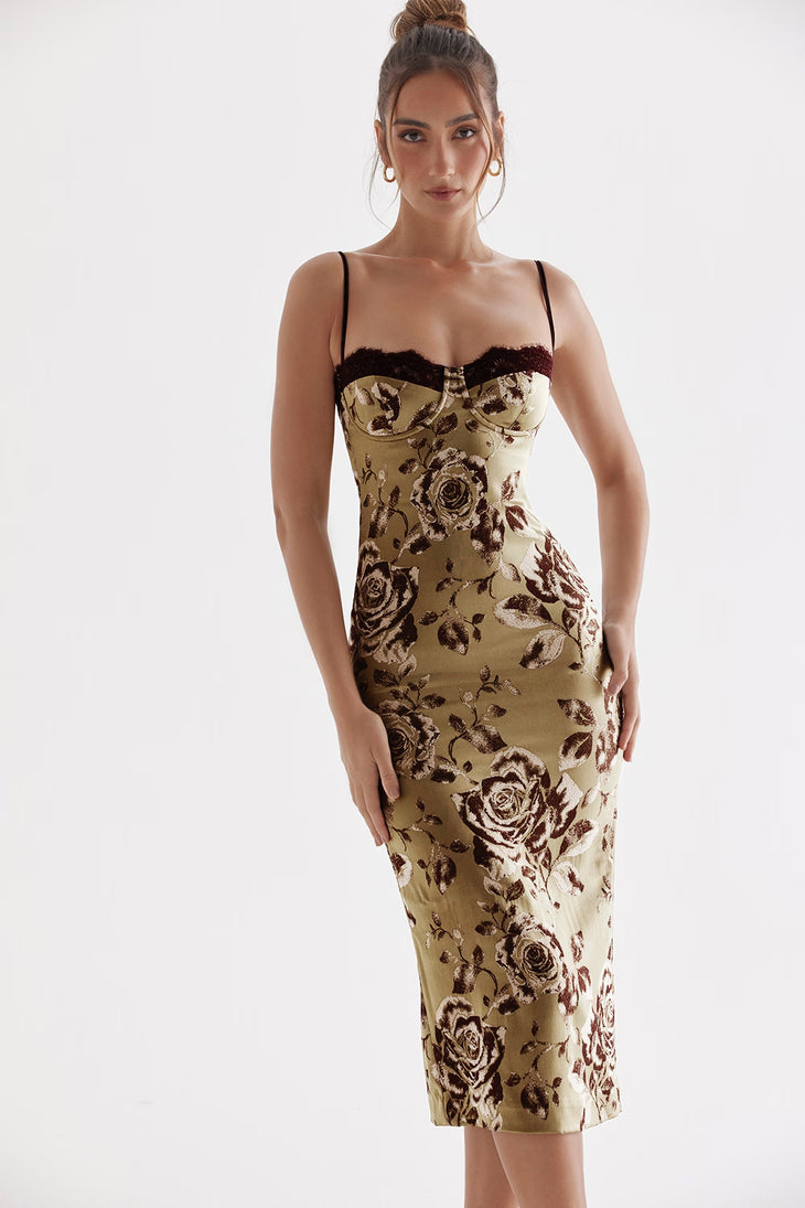 Woman wearing beige floral midi dress with black lace trim and thin straps — House of CB | Endless UAE