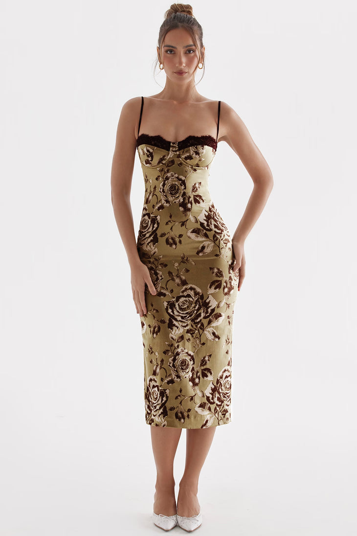 Woman wearing beige floral midi dress with black lace trim and thin straps — House of CB | Endless UAE