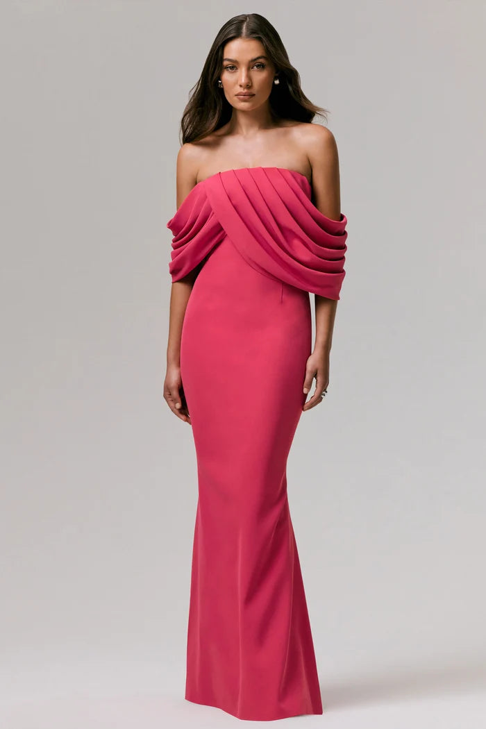 Woman wearing hot pink off-shoulder draped maxi dress with elegant draping detail — Club L London | Endless UAE
