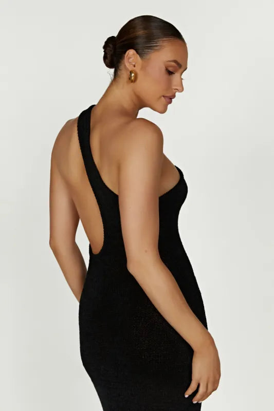 Woman wearing a black one-shoulder knit maxi dress — Meshki | Endless UAE