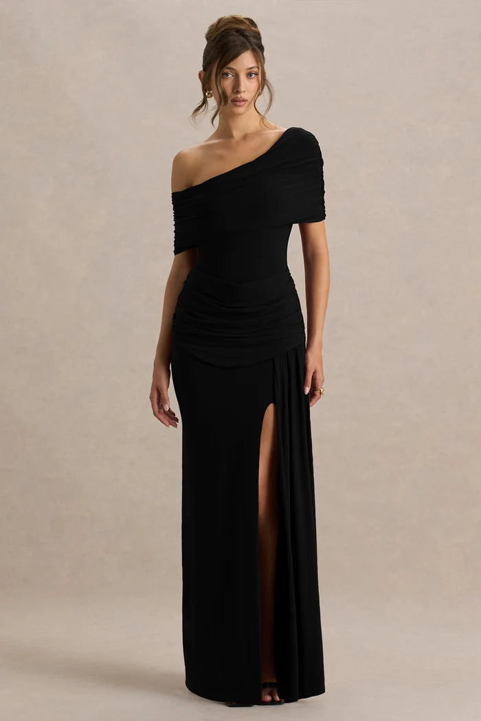 Woman wearing black asymmetric-neck maxi dress with draped off-shoulder sleeve detail — Club London | Endless UAE