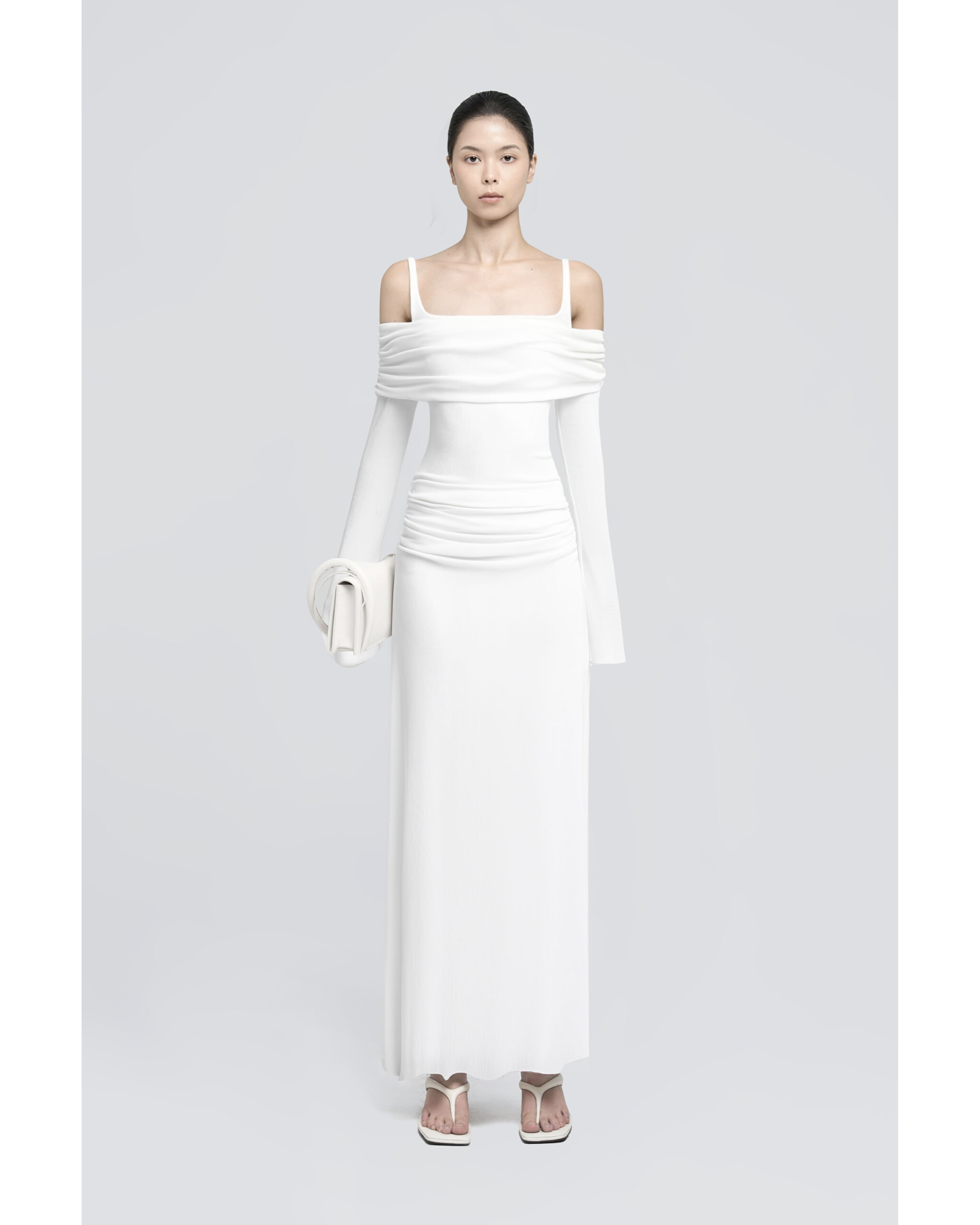 White off-shoulder maxi dress with ruched detailing and matching clutch — CHATS BY C.DAM | Endless UAE