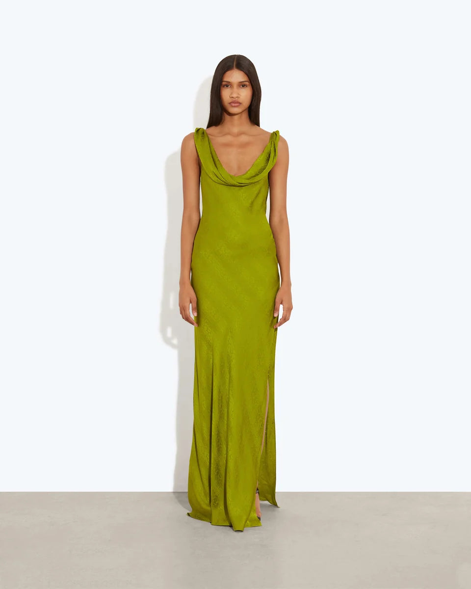 Woman wearing lime green velvet backless maxi dress with draped back detail — Rat & Boa | Endless UAE