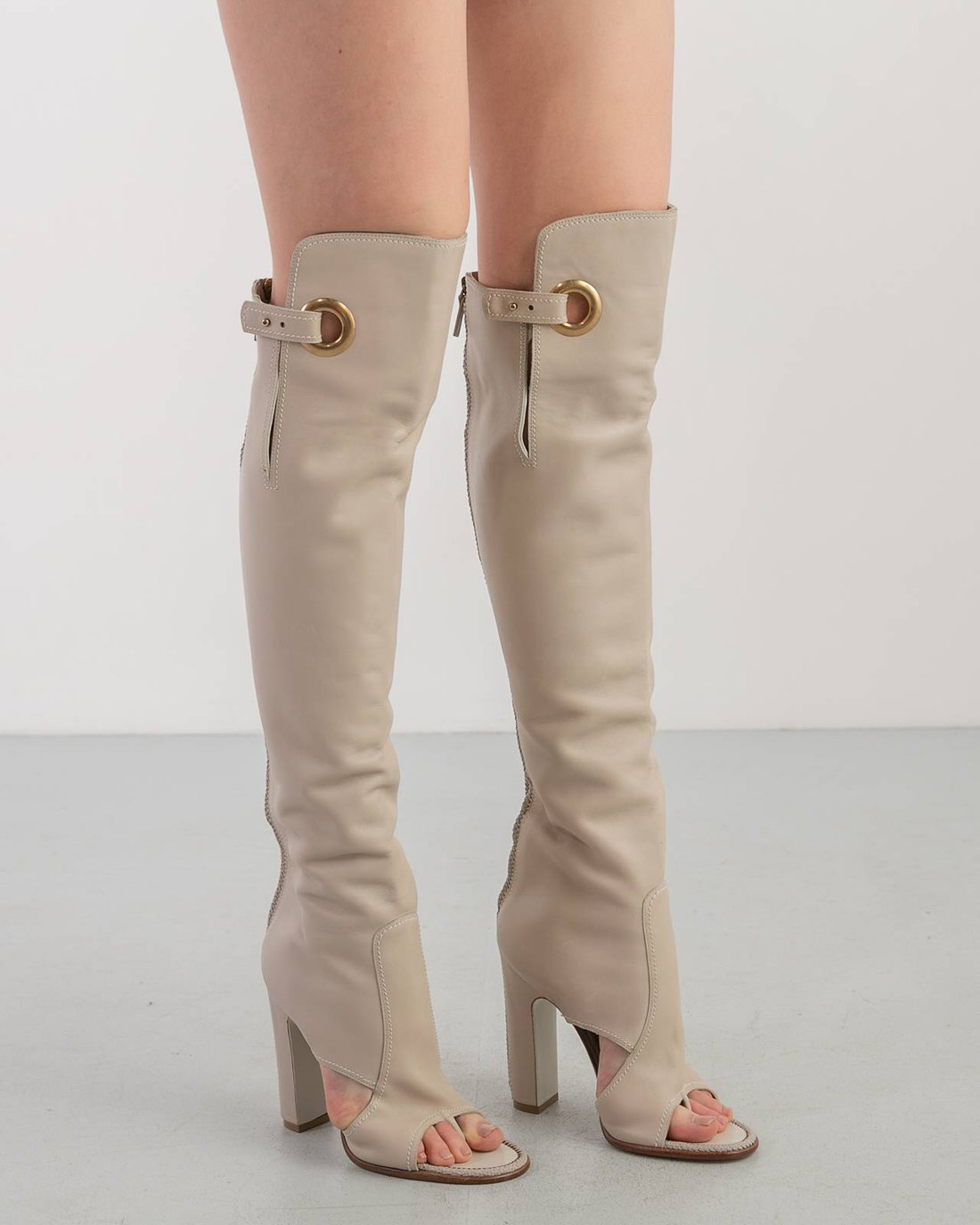 Cream open-toe cutout knee-high boots with block heel and decorative buckle detail — Salvatore Ferragamo | Endless UAE