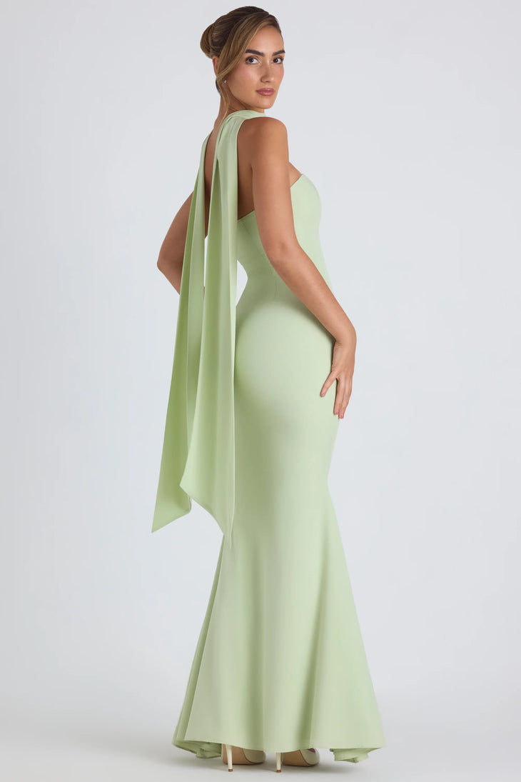 Woman wearing pale green strapless gown with flowing scarf detail — Oh Polly | Endless UAE