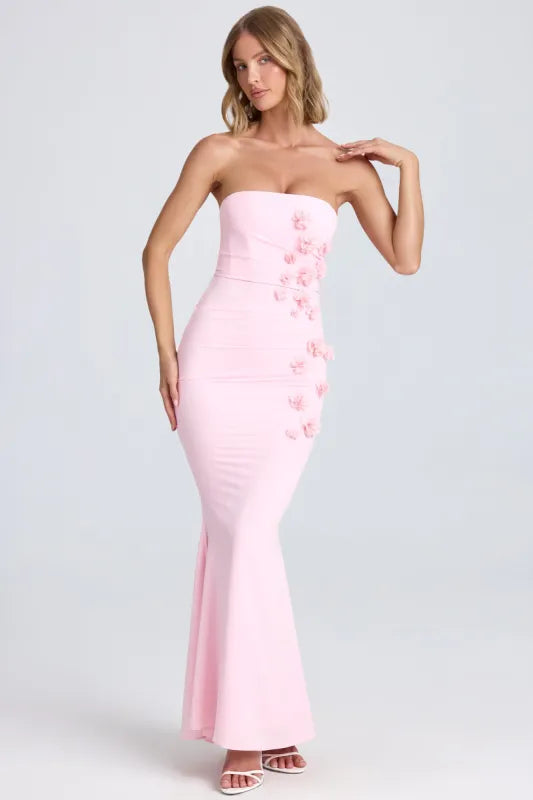 Woman wearing pink strapless maxi dress with floral appliqué details — Oh Polly | Endless UAE