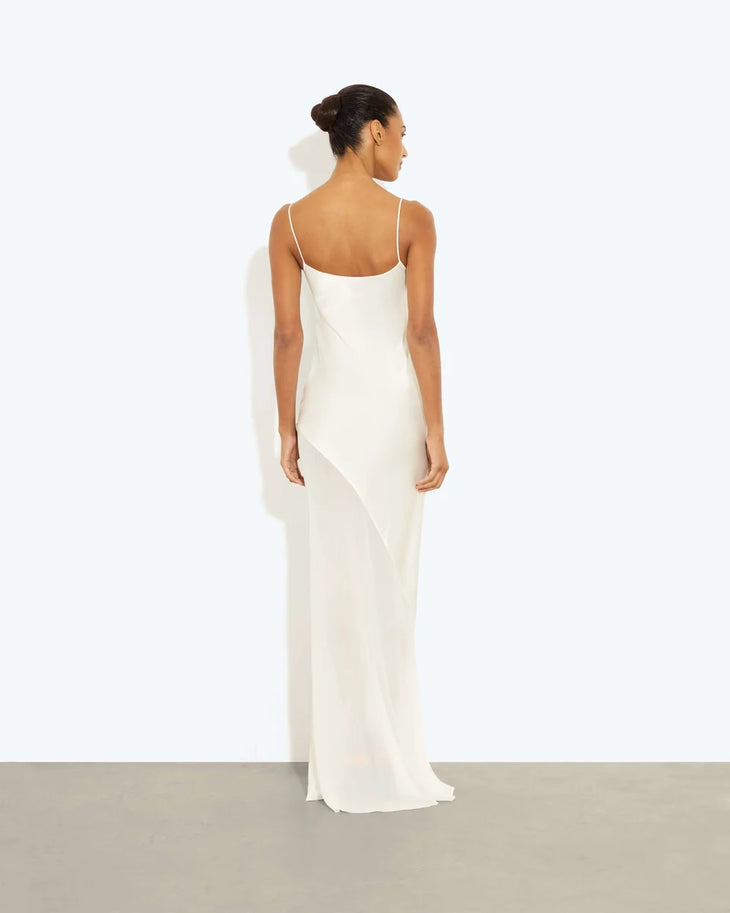 Ruba Slip Dress in cream worn by model against white background — Rat & Boa | Endless UAE