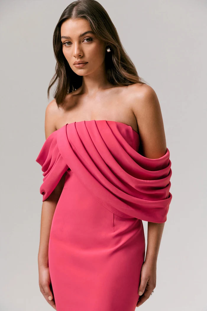 Woman wearing hot pink off-shoulder draped maxi dress with elegant draping detail — Club L London | Endless UAE