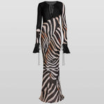 Sabine Dress in zebra print with long sheer sleeves and deep V-neckline — Rat & Boa | Endless UAE