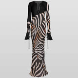 Sabine Dress in zebra print with long sheer sleeves and deep V-neckline — Rat & Boa | Endless UAE