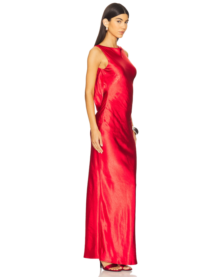 Red sleeveless maxi dress with metallic clutch and silver bangles — Runaway The Label | Endless UAE