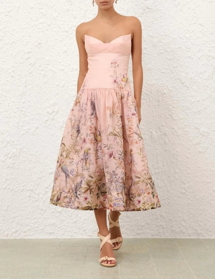 Woman wearing Rebellion Fitted Picnic Dress in pink with floral print, featuring sweetheart neckline and midi length — Zimmermann | Endless UAE