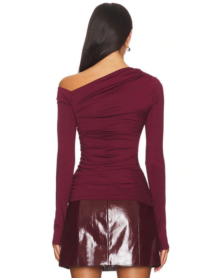 Burgundy one-shoulder long sleeve crop top with off-shoulder neckline — NIA The Brand | Endless UAE