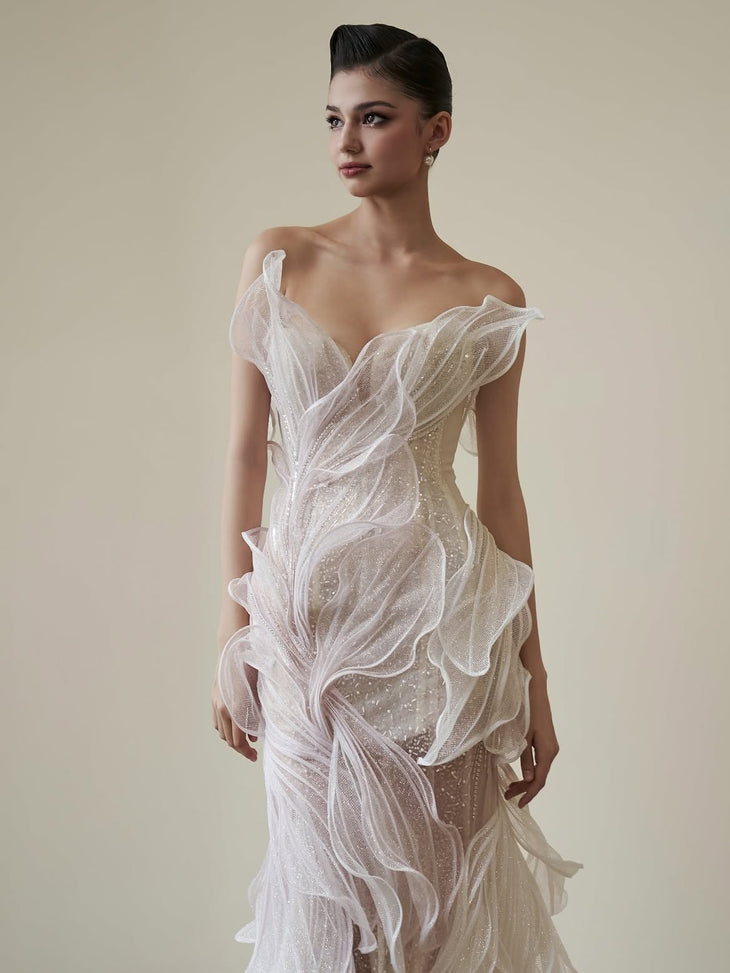 Ethereal off-shoulder gown with layered tulle and beaded embellishments in ivory — HACCHIC | Endless UAE