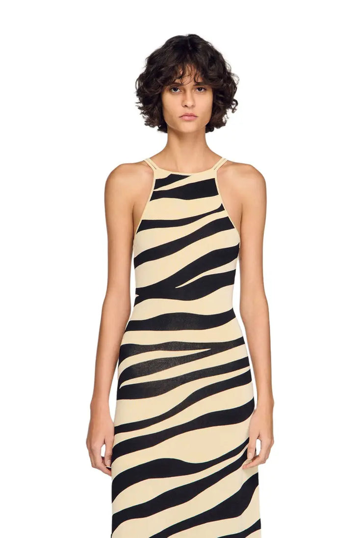 Zebra print knit maxi dress with strappy open back and black heeled sandals — Sandro | Endless UAE