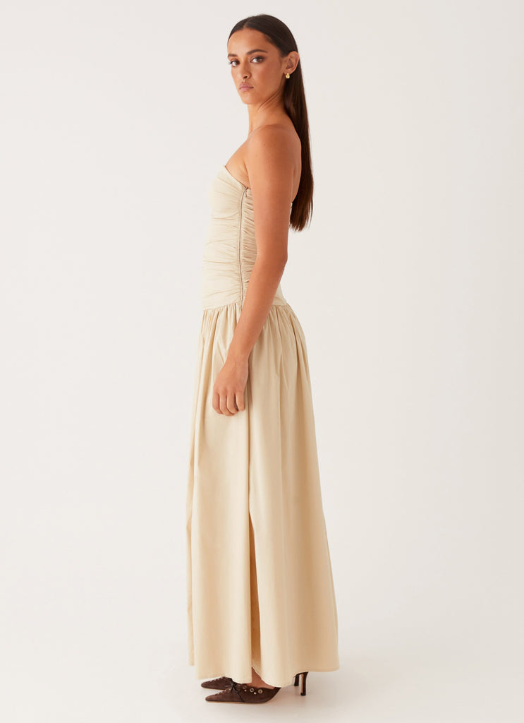 Cream strapless maxi dress with ruched bodice and flowing skirt — Peppermayo | Endless UAE