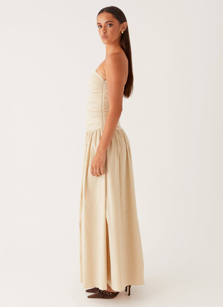 Cream strapless maxi dress with ruched bodice and flowing skirt — Peppermayo | Endless UAE