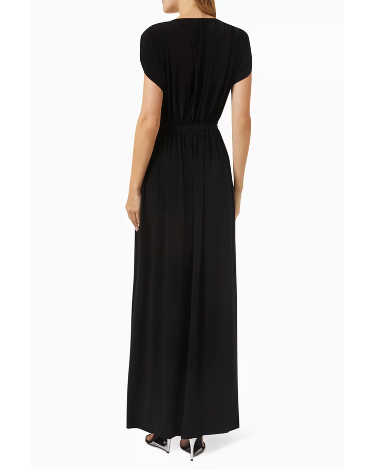 Woman wearing black Athena Maxi Dress with wrap front and cap sleeves — Norma Kamali | Endless UAE