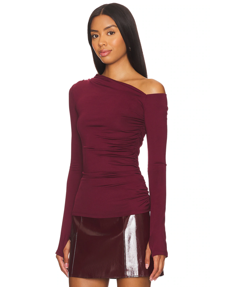 Burgundy one-shoulder long sleeve crop top with off-shoulder neckline — NIA The Brand | Endless UAE